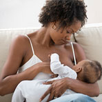 Mother feeding infant